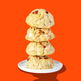 A stack of four Hunky Chunky Strawberry Shortie cookies with freeze-dried strawberries