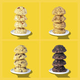 Four stacks of Breakfast Bunch cookies on plates, showing the height of each six-ounce cookie