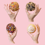 Each Classic Comforts cookie held in a hand, showing that six ounces fills a palm